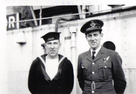 A couple of men in military uniforms
Description automatically generated